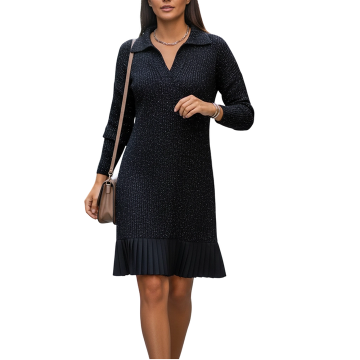 Black speckled knit dress with long sleeves, V-neck, and pleated hem