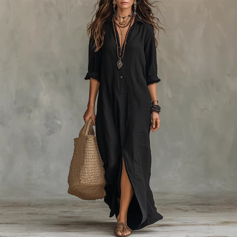 Black relaxed midi shirt dress with button front, 3/4 sleeves, and front slit
