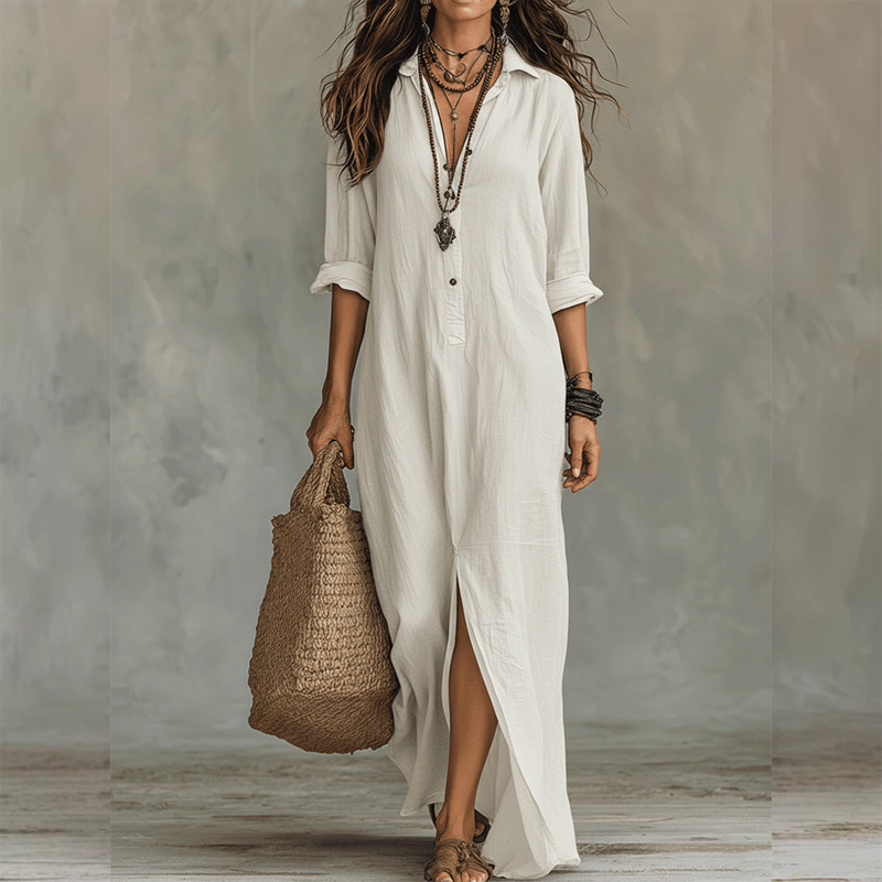 White relaxed midi shirt dress with button front, 3/4 sleeves, and front slit