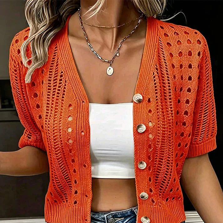 Orange open-knit cardigan with V-neck and button-front, short sleeves, eyelet pattern