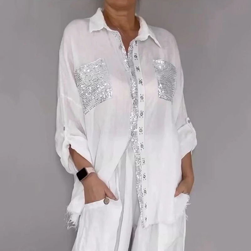 White button-up shirt set with silver sequin chest pockets and matching white pants