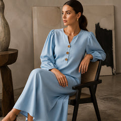 Light blue V-neck maxi dress with puff sleeves and button front