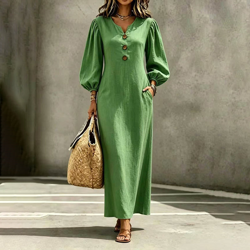 Women's green V-neck maxi dress with puff sleeves and front button closure