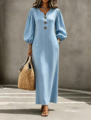 Women's light blue V-neck maxi dress with puff sleeves and button-front placket