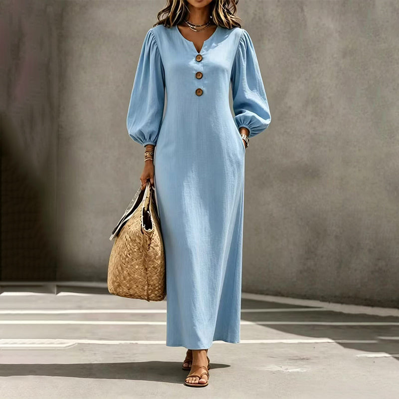 Women's light blue V-neck maxi dress with puff sleeves and button-front placket