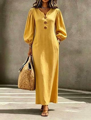 Yellow V-neck maxi dress with puff sleeves and button front, long skirt