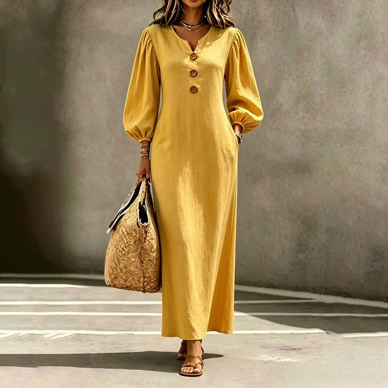Yellow V-neck maxi dress with puff sleeves and button front, long skirt