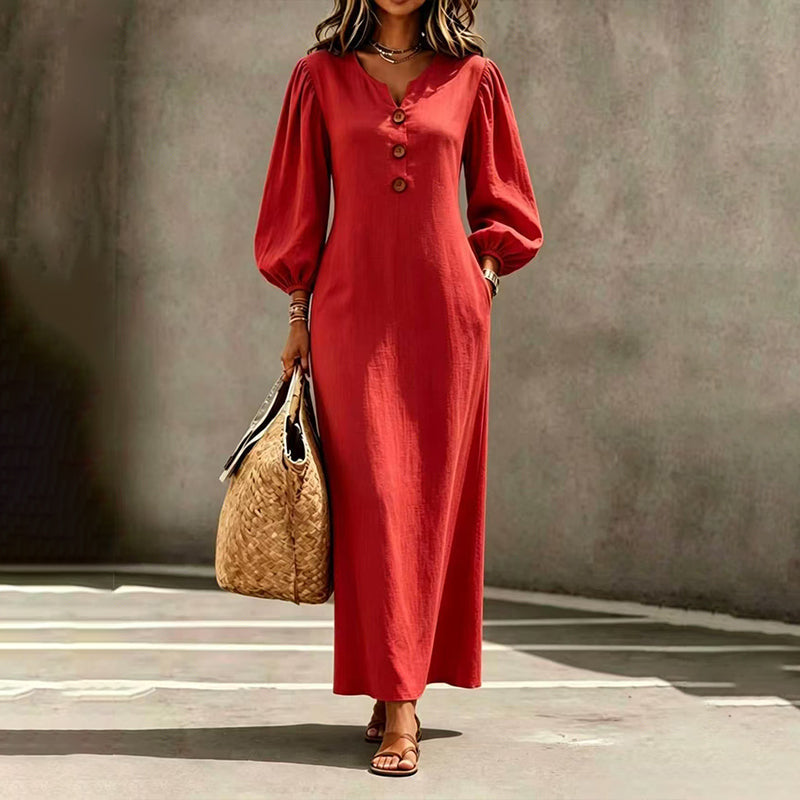 Women's red V-neck maxi dress with puff sleeves and button-front detailing