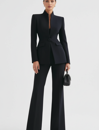 Black blazer and wide-leg palazzo pants set, single-button blazer, tailored fit.