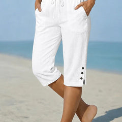 Delphia™ women's calf-length capri pants in white with drawstring waist and side buttons