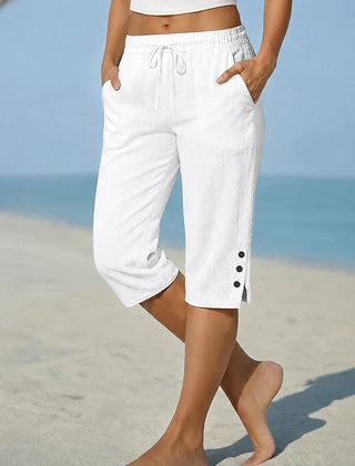 Delphia™ women's calf-length capri pants in white with drawstring waist and side buttons
