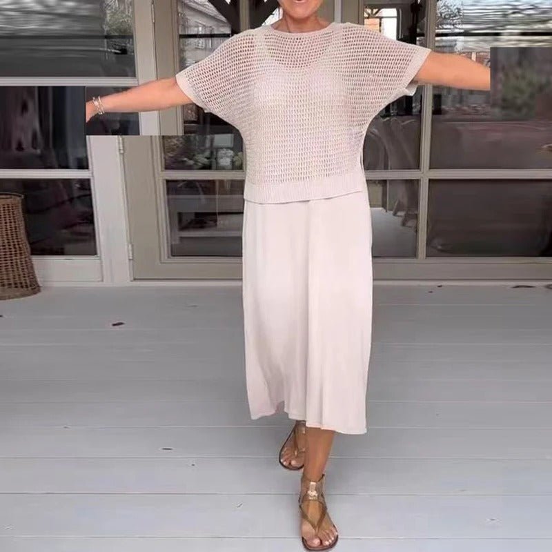 Cream knit two-piece set with a short-sleeve top and white midi skirt
