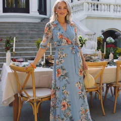 Blue floral wrap V-neck maxi dress with floral print and waist sash, front view