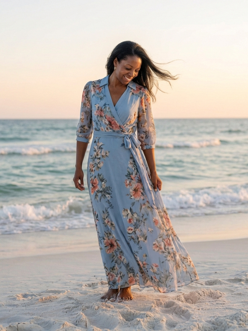 Blue floral wrap V-neck maxi dress with tied waist and flowing skirt