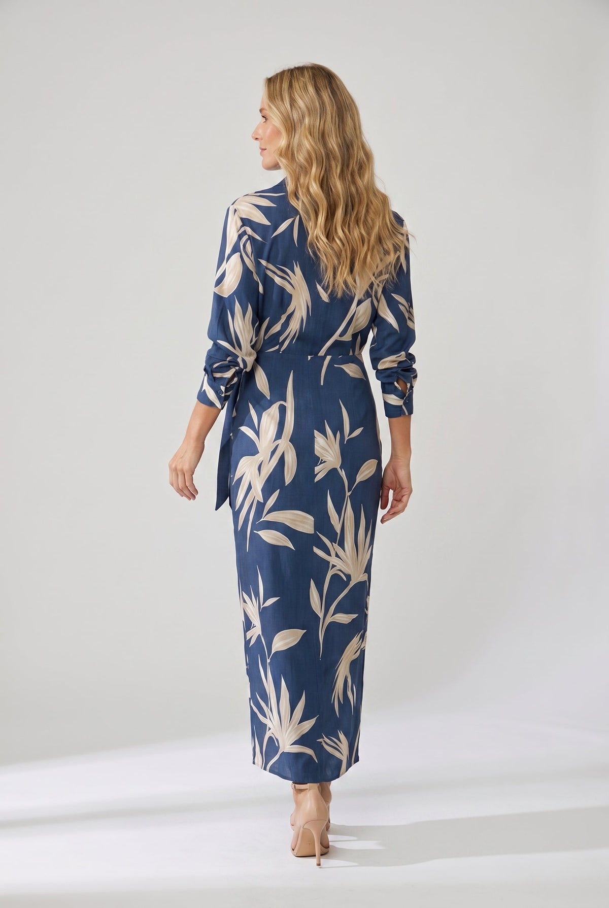 Blue leaf print maxi wrap dress, long sleeves and waist tie, back view
