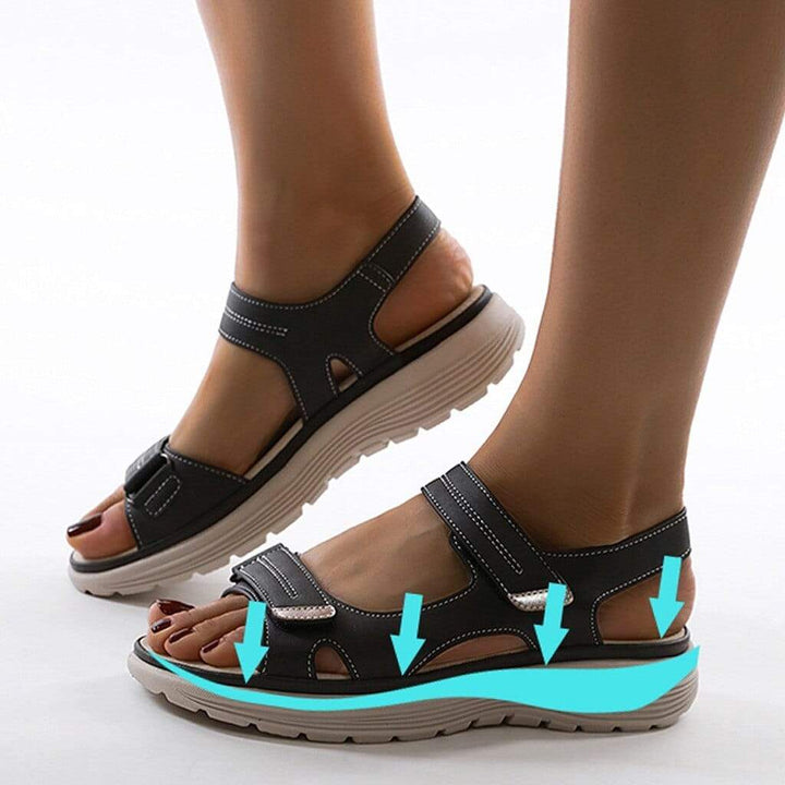 Black supportive sport sandal with two hook-and-loop straps and platform sole