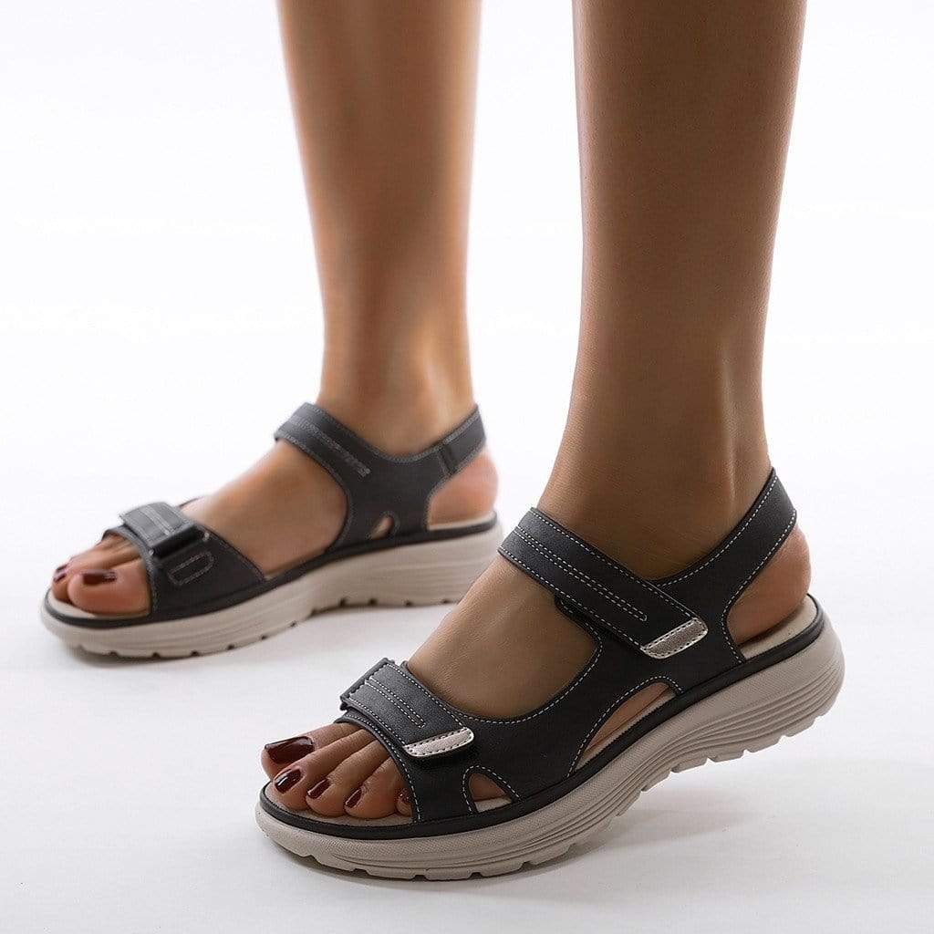 Black supportive sandal with double hook-and-loop straps and open toe