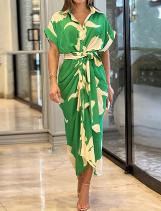 Green wrap maxi dress with cream leaf pattern, short sleeves and tie waist