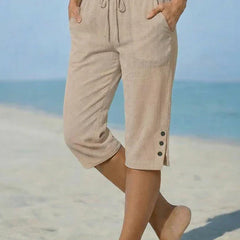 Delphia™ women's calf-length capri pants in beige with drawstring waist and side buttons