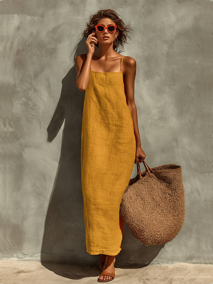 Yellow sleeveless midi dress with square neckline and thin spaghetti straps, textured woven look