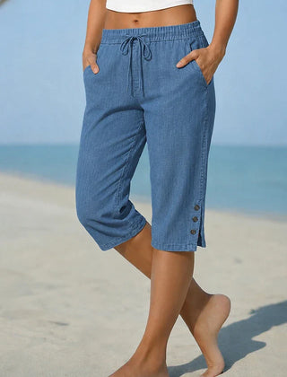 Delphia™ women's calf-length capri pants in blue with drawstring waist and side buttons
