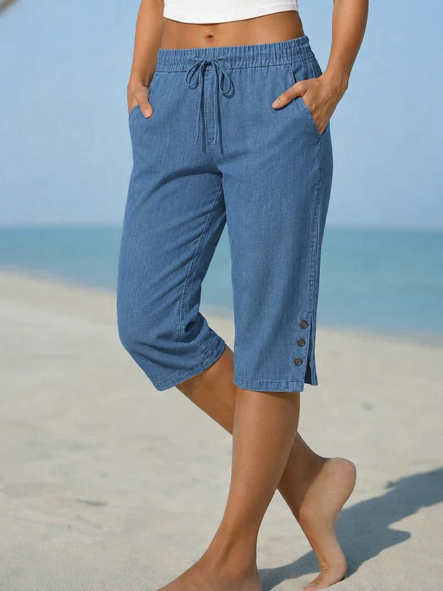 Delphia™ women's calf-length capri pants in blue with drawstring waist and side buttons