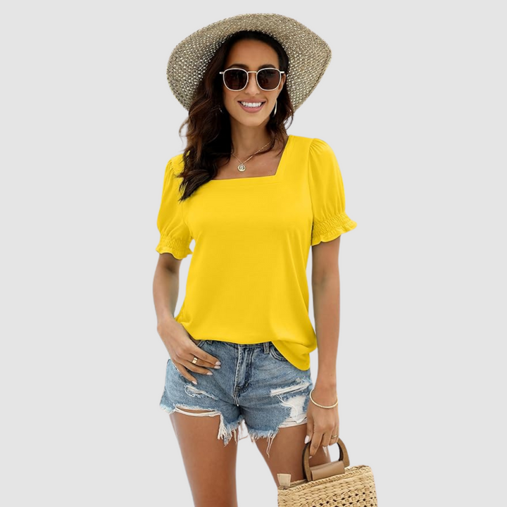 Yellow square-neck blouse with short puff sleeves and gathered cuffs.