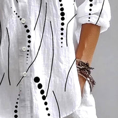 Kristen™ white button blouse close-up: black dot-and-line print, white buttons